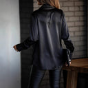 Chic Silk Blouse with Deep V-Neck & Drop-Shoulder Design