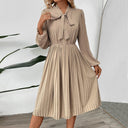 Chic Pleated Dress with Neck Tie & Long Sleeves