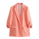Chic Blazer Jacket with Structured Sleeves and Gold Accents