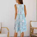 Airy Summer Dress with Flowing Skirt and Decorative Accents