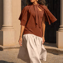 Chic Women's Dress with Flowing Overlay and Defined Waist
