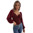Chic Women's Bodysuit with Knot Accents and Puff Sleeves