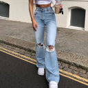 Trendy High-Waisted Flared Jeans with Ripped Accents