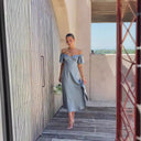 Chic Off-Shoulder Maxi Dress with Ruffle Accents