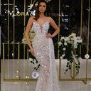 Stunning Evening Dress with Sequined Detail and Sheer Overlay
