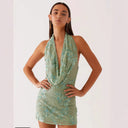 Elegant Sheath Dress with Deep V-Neck and Embroidered Detailing