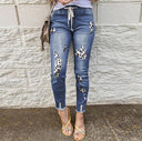 Trendy Animal Print Women's Jeans with Distressed Accents