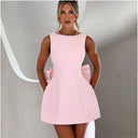 Chic Sculptural Mini Dress with Pearl Accents
