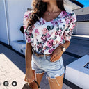 Vintage-Inspired Women’s Distressed Denim Shorts with Unique Hem