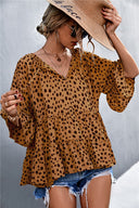Chic Women's Blouse with Statement Sleeves and Polka Dot Design