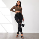 Women's High-Waisted Ripped Skinny Jeans with Chic Button Placket