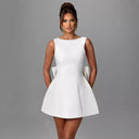 Chic Sculptural Mini Dress with Pearl Accents