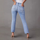 Chic Flared Jeans with Frayed Hems and Trendy Distressed Style