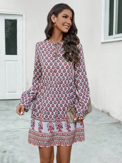 Chic Ladies' Dress with Intricate Pattern and Stylish Slit