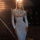 Chic Evening Dress with Sheer Bodice and Decorative Details