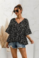 Chic Ruffle Detail Blouse with Modern Polka Dot Design