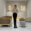 Glamorous Evening Dress with Shimmering Top and Flattering Skirt