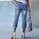 Trendy Women's 3/4 Jeans with Fringed Hem Design