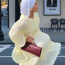 Chic Pleated Maxi Dress with Ruffles and Long Sleeves