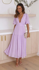Chic Maxi Dress with Deep V-Neck and Flowy Skirt