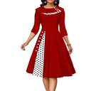 Chic Midi Dress with Dots & Contrast Trim
