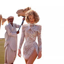 Stunning Sequin Dress with Sheer Accents and Fringes