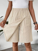 Chic Women's Knee-Length Wrap Skirt with Elastic Waist and Convenient Pockets