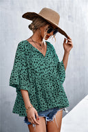 Chic Women's Blouse with Statement Sleeves and Polka Dot Design