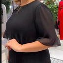 Chic Midi Dress with Sheer Sleeves and Ruffle Details