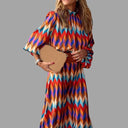 Vibrant Midi Dress with Herringbone Design and Waist Belt