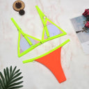 Chic Two-Piece Bikini Set with Gold Accents and Triangle Cups