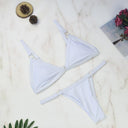 Chic Two-Piece Bikini Set with Gold Accents and Triangle Cups