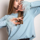 Feather Accented Long Sleeve Top